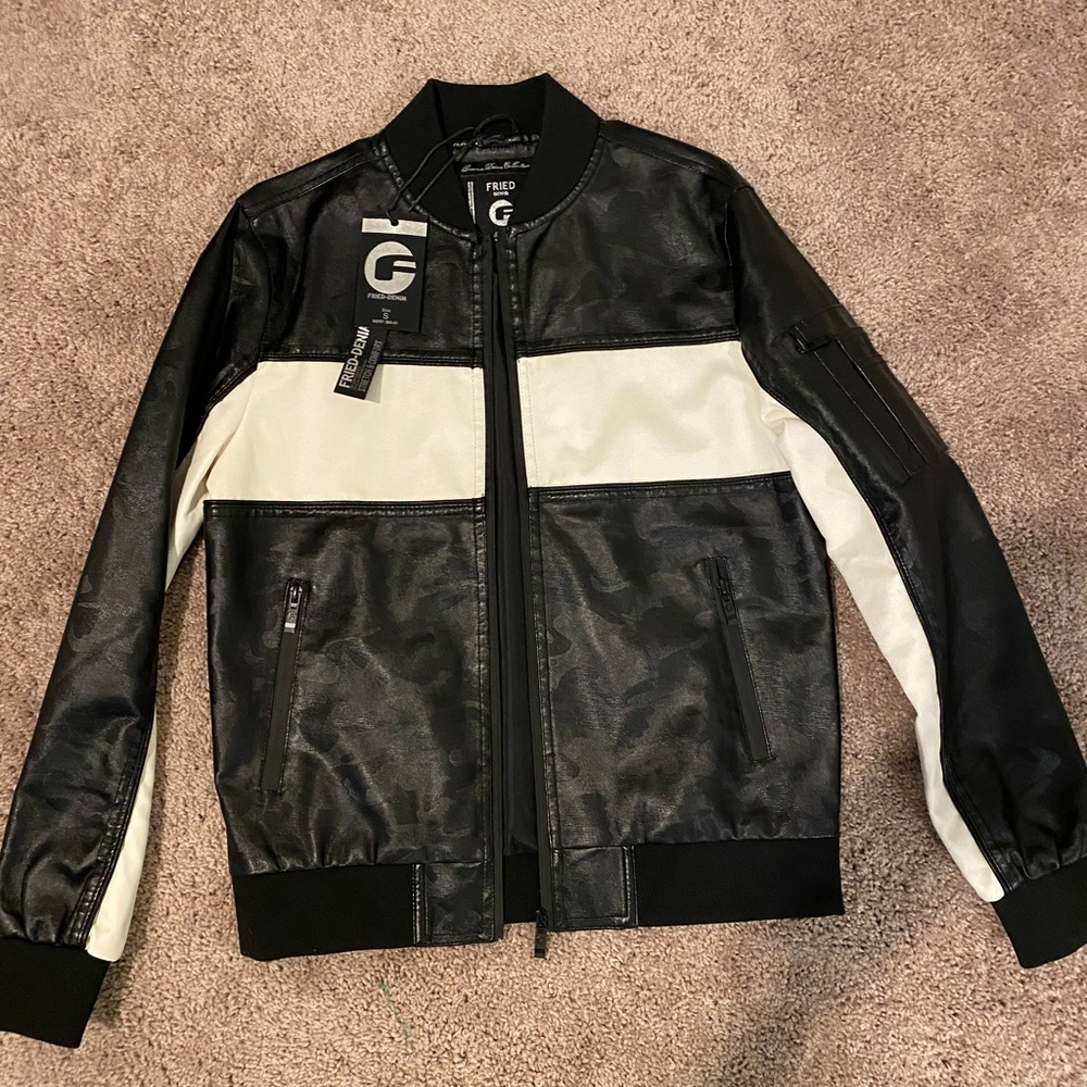 New with tags pleather black and white jacket! Smoke free home, new condition!